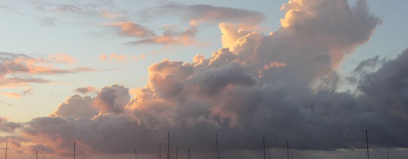 Sailing yacht anchored near a Caribbean coastline